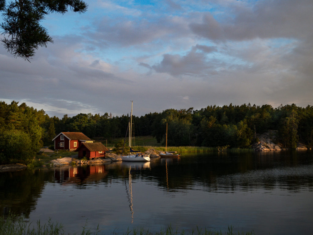 sunrise view of our campsite with boat