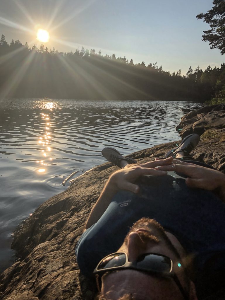 Relaxing by the lake at our campsite